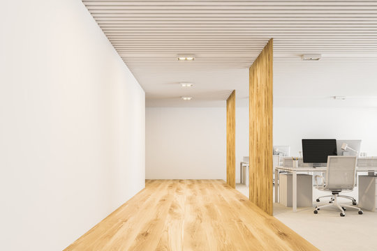 White, wooden modern open plan office front view