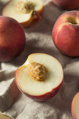 Fototapeta na wymiar Raw Ripe Organic White Peaches