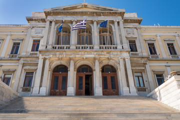 Obraz premium Facade of the neoclassical city Hall by Ernst Ziller in Miaouli square, Syros island, Cyclades, Greece
