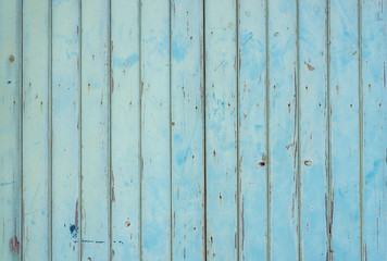 Vintage turquoise wooden planks with old faded paint texture