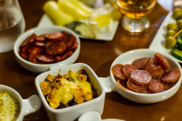 Set with different appetizers in small portions, healthy and delicious snacks