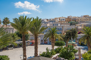 Central square or Miaoulis square with palm trees of Ermoupolis city in Syros island, Cyclades, Greece