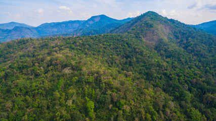 Naklejka na ściany i meble aerial photography landscape of Thanlod Yai cave to Thanlod Noi cave between two caves there have many waterfall along the way water from Thanlod Yai cave pass in to Than Lod Noi cave