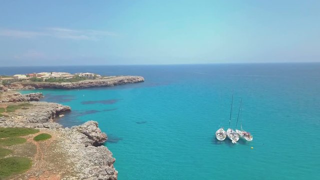 Tropical Ionian Greece Blue Lagoon island Aerial 4k travel video. Ocean sea forest coast seashore, water, yacht boat