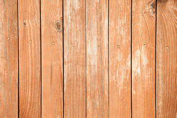 Old wood background with shabby red paint.close-up