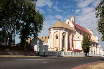Fototapeta na wymiar Grodno. Belarus. The entrance to the catalytic monastery and seminary and the inscription on the gate in Latin, which translates as - the Grodno Catholic Seminary.