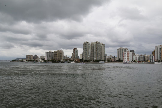 City with buildings and beach at the same time, city of Guaruja, beach South America, Brazil 