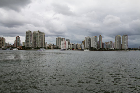 City with buildings and beach at the same time, city of Guaruja, beach South America, Brazil 