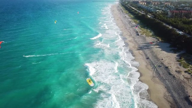 Aerial Footage over Juno Beach, Fl with multiple kite surfers