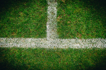 Close up of grass and marks on football or soccer field 2018