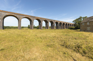 Arches / An image of the amazing Harringworth Viaduct with a span of eighty two arches  1,275 yards long (1.166 km) shot at Harringworth, Northamptonshire, England, UK.