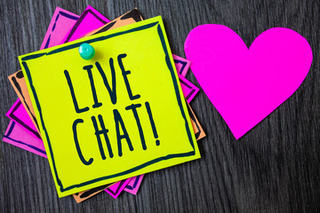 Handwriting text writing Live Chat Motivational Call. Concept meaning Real time media conversation Online communicate Border sticky remember cards love heart pinned dark woody background.