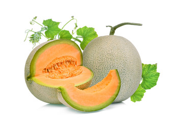 whole and slice of japanese melons, orange melon or cantaloupe melon with green leaf isolated on white background