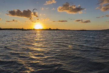 Kitesurfing during sunset at Elafonisi beach, with Balos beach both in Crete Island, maybe the nicest beaches in the world