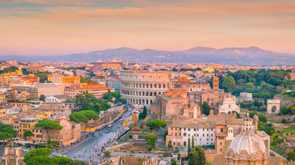 Fototapeta premium Top view of Rome city skyline with Colosseum and Roman Forum