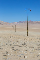 An infinite electrical line going to an endless horizon carrying with it the energy to feed the small populations inside the Atacama Desert, one of the most remotes places on Earth