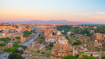 Top view of  Rome city skyline with Colosseum and Roman Forum