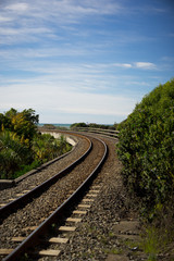 Fototapeta na wymiar Train track and blue sky