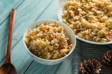 Egg Fried rice with a blue wood grain background