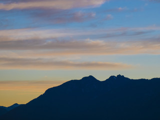 Amazing Sunrise Beyond the Mountains