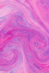 Abstract pink blue background on liquid, texture with paints, multicolored pattern for designer, abstract pattern from food dyes on milk, blank for designer