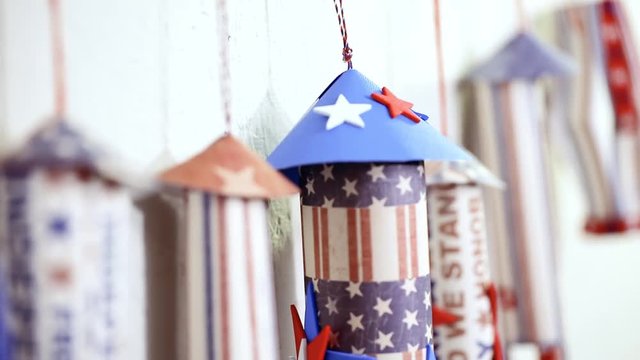 Paper firecrackers made from red, white and blue paper for July 4th celebration