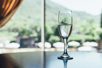 a glass of clean drinking water on a table