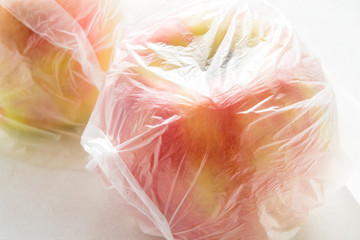 Apples packed in a plastic bag