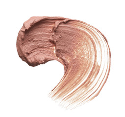 Light beige makeup smear of creamy foundation