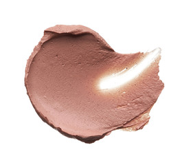 Light beige makeup smear of creamy foundation