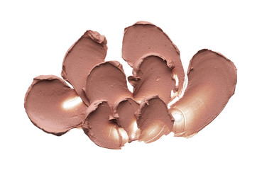 Light beige makeup smear of creamy foundation