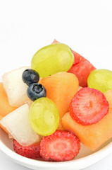 Colorful fruit salad with copy space