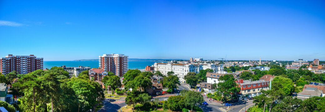 Beautiful panorama view of Bournemouth's town centre against blue sky on a sunny summer day. Dorset, United Kingdom.