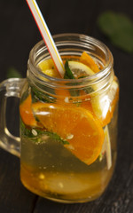 Refreshing summer cocktail with crushed ice and citrus fruits