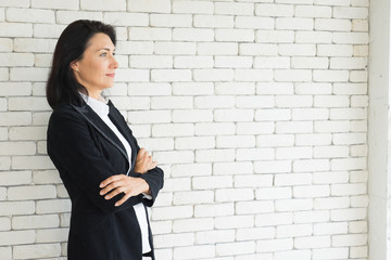 Modern business old woman in the office with copy space