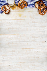 Oktoberfest food menu, bavarian sausages with pretzels, mashed potato, sauerkraut, beer bottle and...