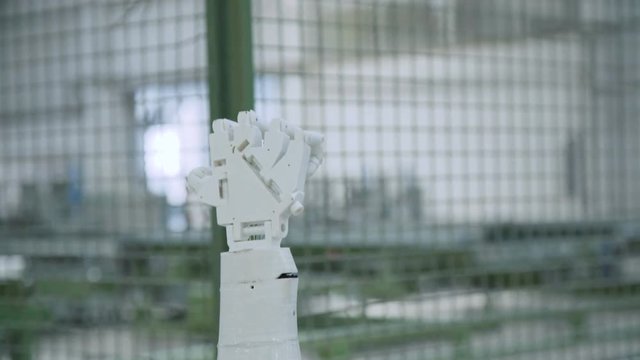 The robotic hand show sign of steepness on the camera. 4K
