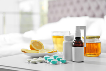 Set of different cold remedies on table indoors
