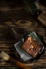 brownie chocolate macadamia dessert baked sweet on wood background
