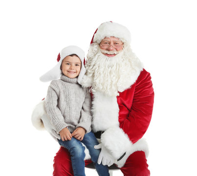 Little boy and authentic Santa Claus on white background