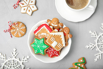 Plate with tasty homemade Christmas cookies on table