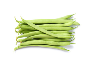 Pile of fresh green beans on white background