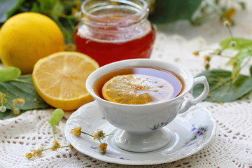 Herbal tea with linden flowers, honey and lemon