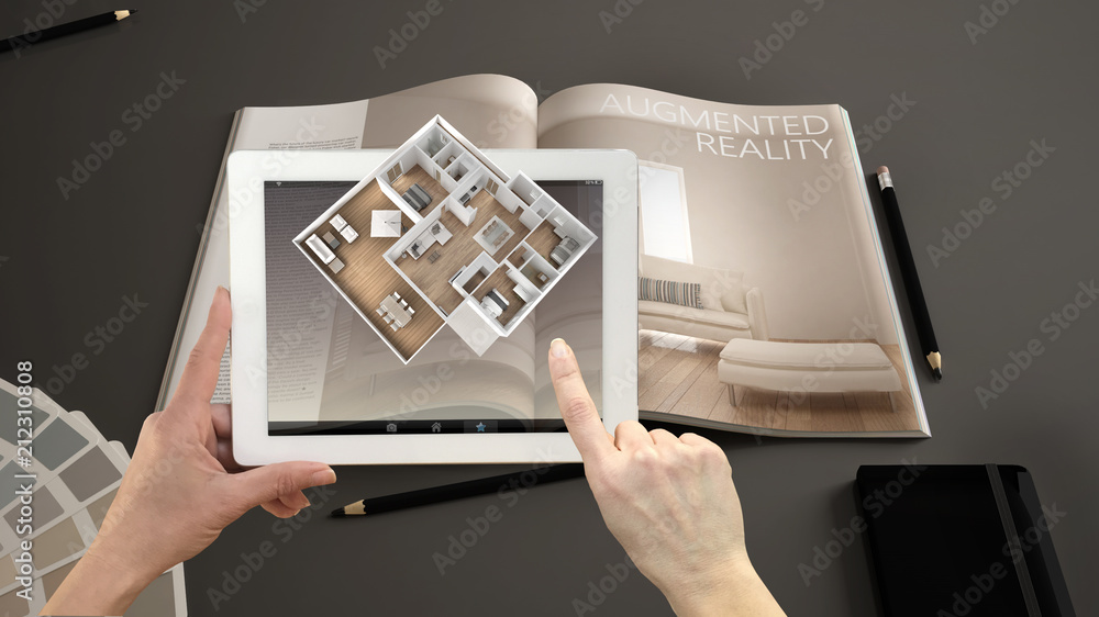 Wall mural augmented reality concept. hand holding tablet with ar application used to simulate 3d pop-up intera