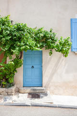 Pretty blue door in Venasque, Provence, France
