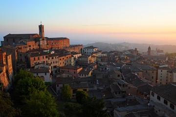 Fototapeta na wymiar The City Town and landscape of Montepulciano at sunrise in the morining in Tuscany, Italy