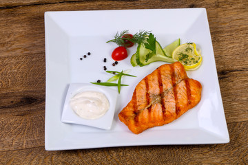 Grilled salmon with sauce