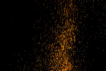 Sparks and fire on a black background