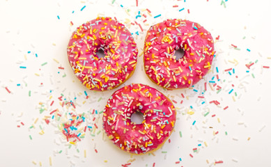 pink donuts with sprinkles 