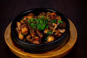 Roasted mushrooms in the pan
